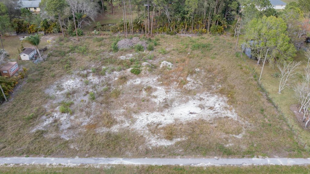 Photo of Xxx Citrus Grove Boulevard, The Acreage, FL 33470 (MLS # R10938291)