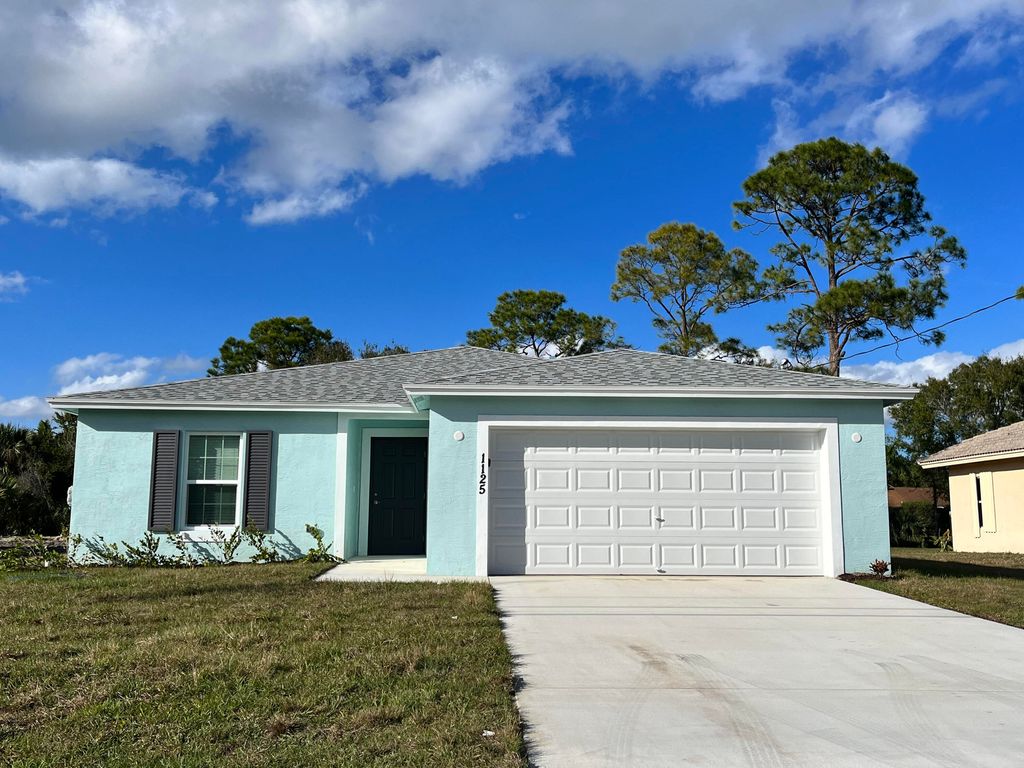 Photo of 1125 SW Ingrassina Avenue, Port Saint Lucie, FL 34953 (MLS # R10767946)