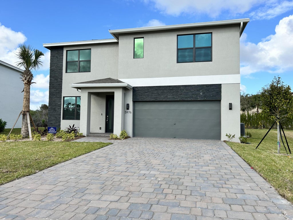 Photo of 5976 SE Sky Blue Cir, Stuart, FL 34997 (MLS # R10966143)