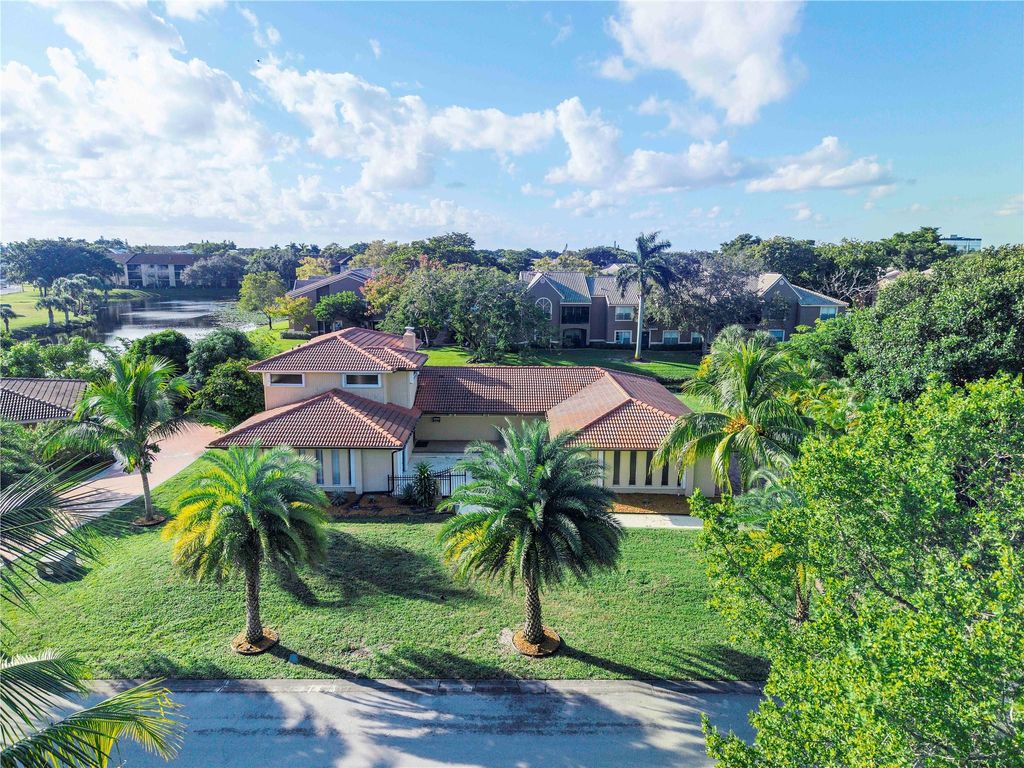 Photo of 9030 NW 32nd St, Coral Springs, FL 33065 (MLS # F10534041)