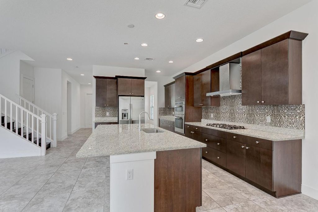 Photo of 1205 Faulkner Terrace, Palm Beach Gardens, FL 33418 (MLS # R10968204)