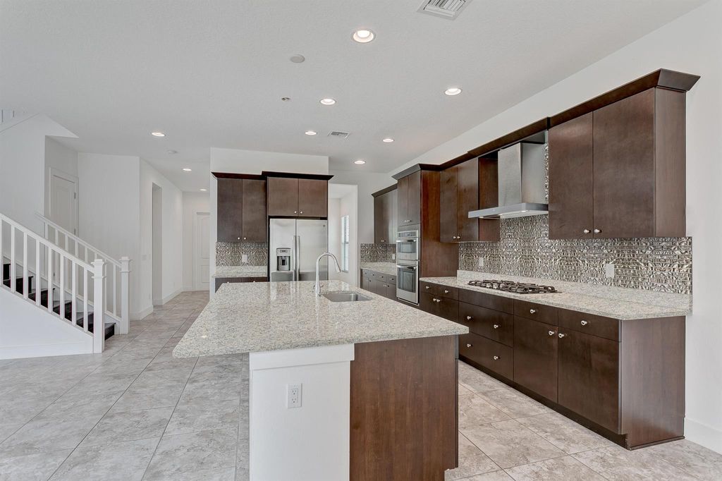 Photo of 1205 Faulkner Terrace, Palm Beach Gardens, FL 33418 (MLS # R10968204)