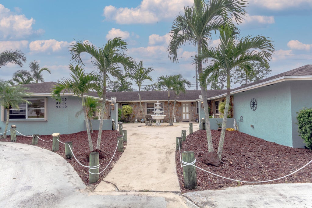 Photo of 9015 W Highland Pines Boulevard, Palm Beach Gardens, FL 33418 (MLS # R11068080)