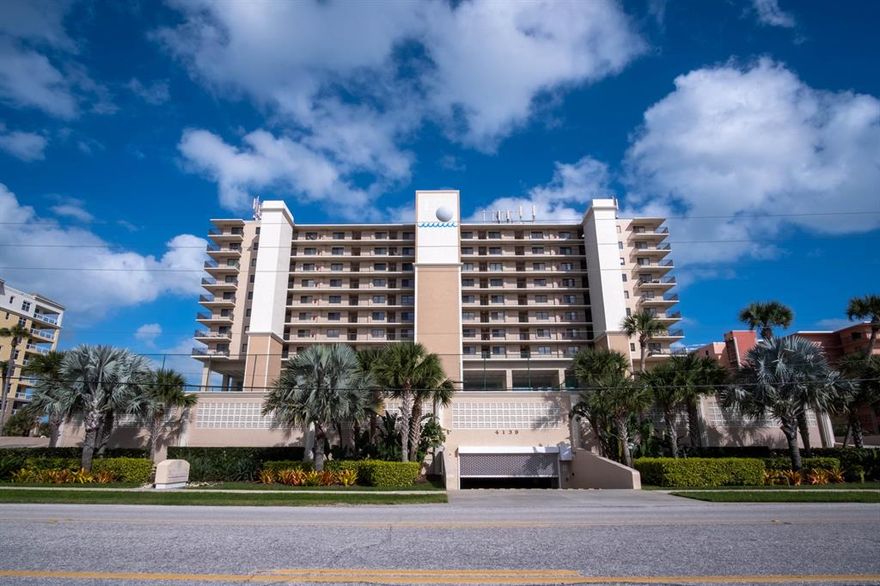 2 bedroom 2 full bath condo situated in the Moontide Community. This condo has been completely updated – nothing else like it in the entire building!  Brand new kitchen with solid wood cabinets, granite countertops and stainless steel appliances.  All new flooring throughout with plank tile in the living areas and master and carpet in the second bedroom.  Both bathrooms have been updated with new tile work.  Brand new light fixtures and fans throughout.  Open and spacious floor plan with tons of natural light and views of the ocean! Massive balcony overlooking the beach and ocean. Moontide has tennis courts, shuffleboard, and a heated roof top pool!