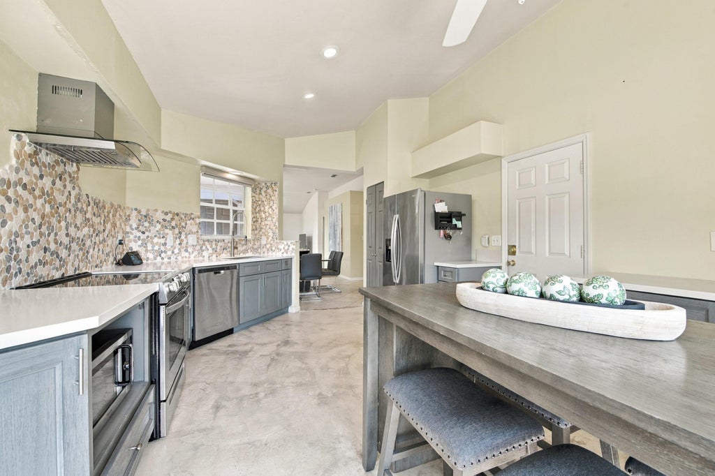Photo of 14 HEATHER TRACE Drive, Boynton Beach, FL 33436 (MLS # B26076653)