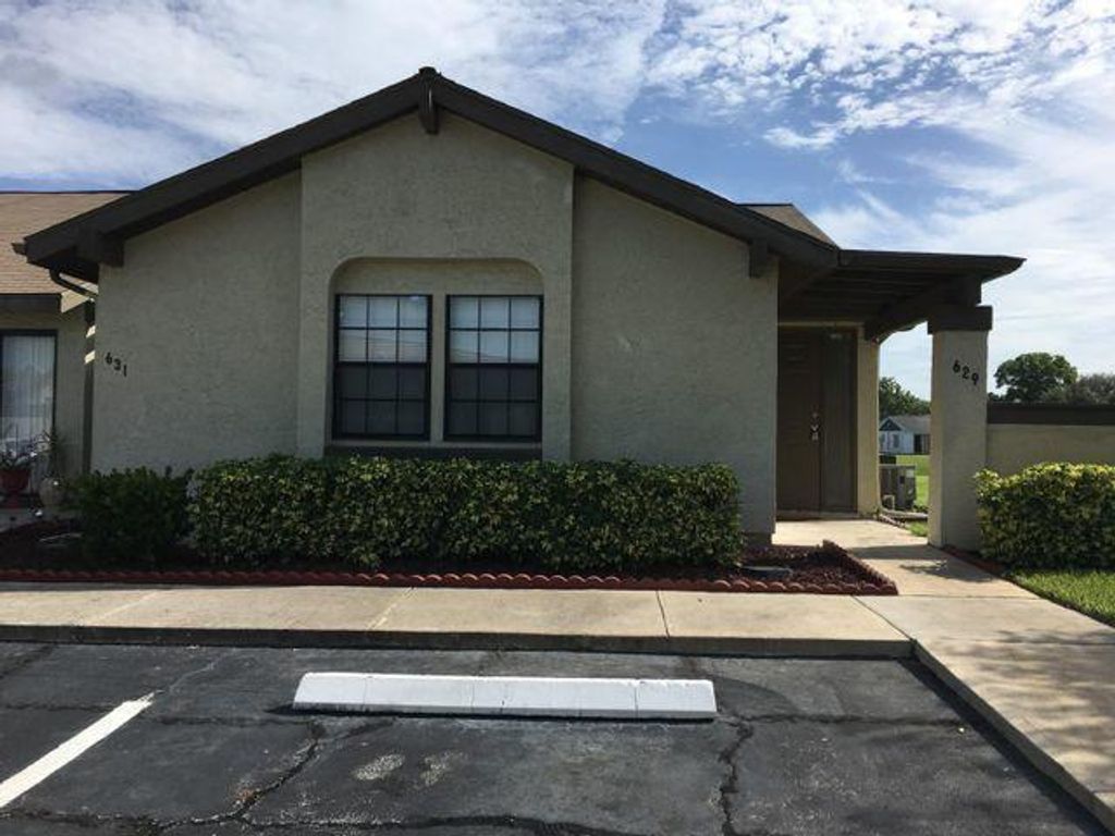 Photo of 629 SW Jeanne Street, Port Saint Lucie, FL 34953 (MLS # R10725654)