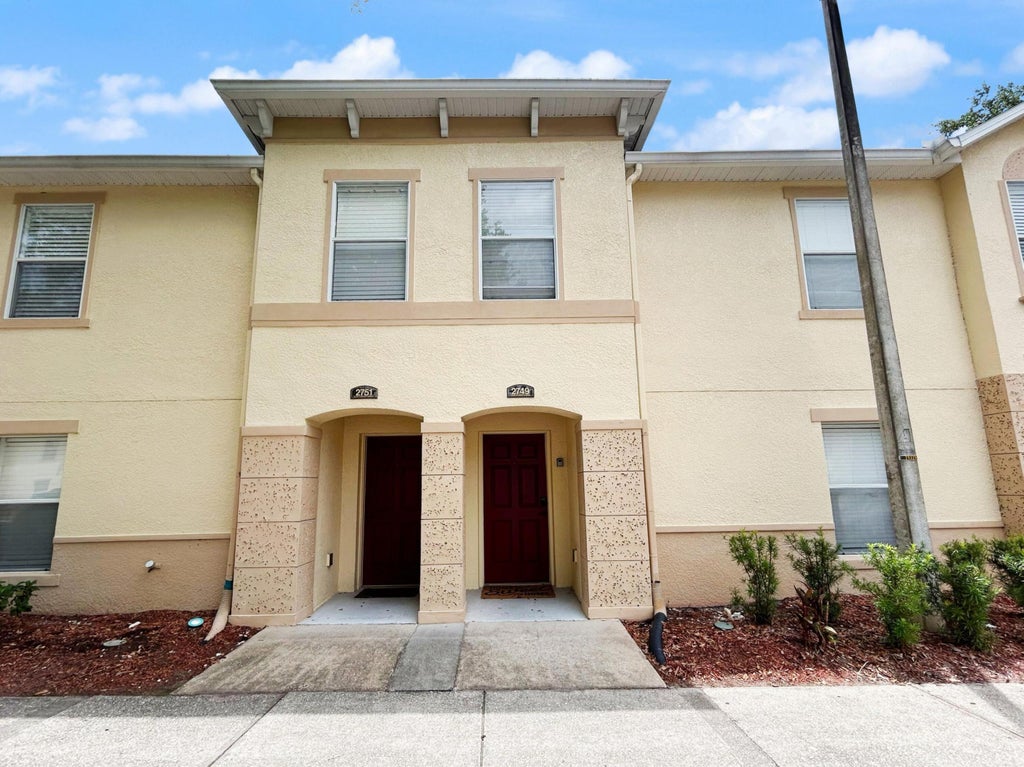 Photo of 2749 Club Cortile Circle, Kissimmee, FL 34746 (MLS # B26032528)