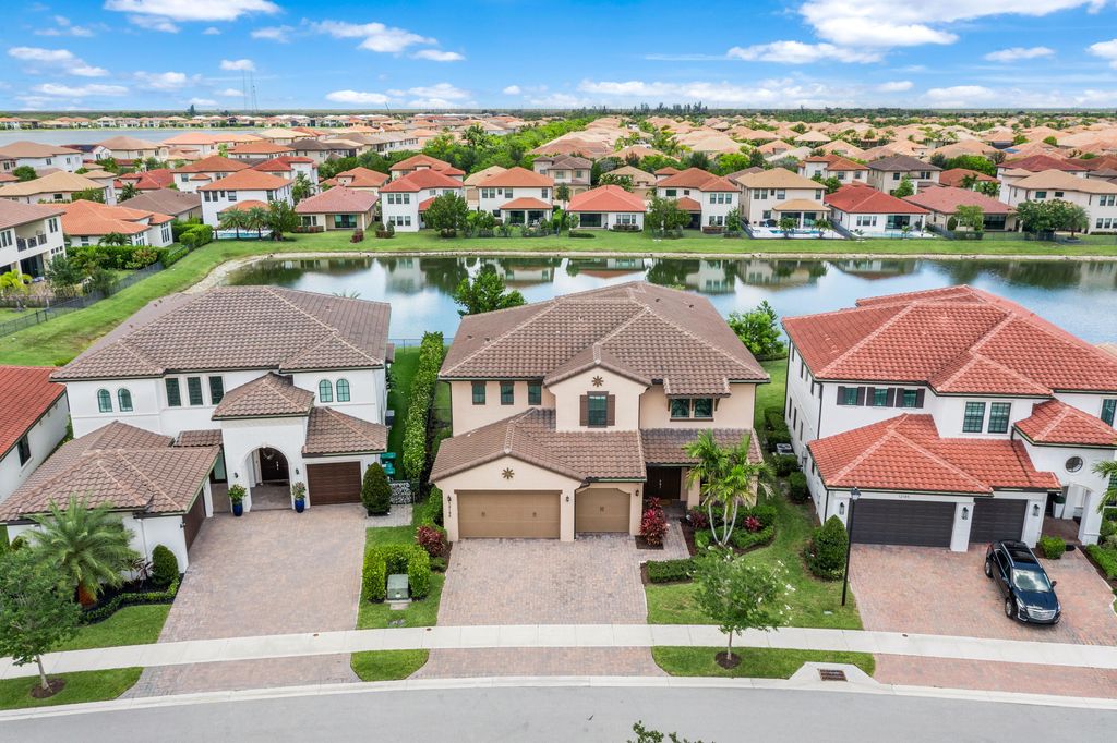 Photo of 12195 Lake Trail Lane, Parkland, FL 33076 (MLS # B26035400)