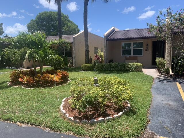BEAUTIFUL, SPACIOUS 2/2 VILLA , TOTALLY UPDATED CEILING TO FLOOR. KITCHEN HAS NEW CABINETS,QUARTZ COUNTERS, SS APPLIANCES, ALL NEW PLUMBING & ELECTRICAL. THIS HAS A FORMAL DINING RM W/ LEAD GLASS DESIGNER PICTURE WINDOW,. ALL HURRICANE IMPACT WINDOWS & FRONT DOOR. BOTH BATHS HAVE SIT DOWN SHOWERS. LANAI HAS TWO CLOSETS W/ CUSTOM CABINETRY & SHELVES. ONE HAS WASHER & DRYER. REMOTE CONTROL BLINDS ON LANAI & DIN/RM WINDOWS. BEAUTIFUL WATER VIEW IN BACK! LOCATED CLOSE TO CLUBHOUSE B & ALL THE AMENITIES & THERE ARE PLENTY TO ENJOY ! 55+ COMMUNITY W/ 24/7 GUARD GATED SECURITY. LOCATED CLOSE TO SHOPPING, RESTAURANTS & TURNPIKE ! AIRPORT & OCEAN A SHORT DRIVE AWAY ALSO. MUST SEE TO LOVE !