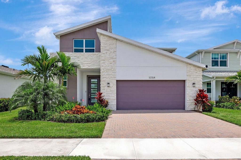Photo of 10704 SW Estella Lane, Port Saint Lucie, FL 34987 (MLS # R11057707)