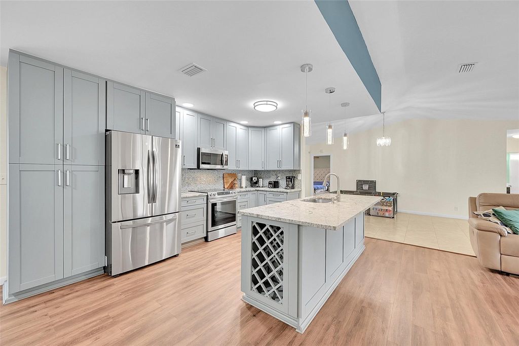 Photo of 6411 NW 89th Ave, Tamarac, FL 33321 (MLS # F10538920)