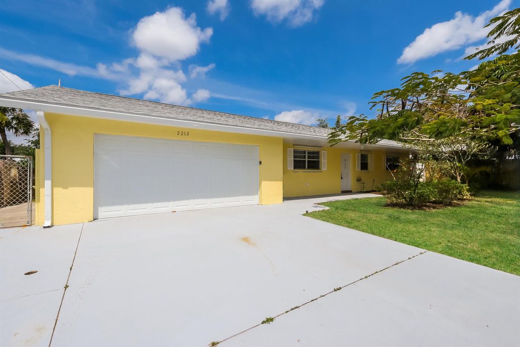 Photo of 2212 NE 21st Avenue, Jensen Beach, FL 34957 (MLS # R10920809)