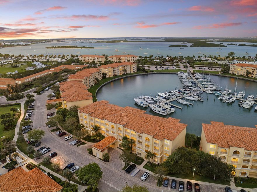 2005-built. An hour north of Palm Beach! Fabulous penthouse end unit marina-view at Hutchinson Island's renowned Harbour Isle on much-faved Hutchinson Island. 1989 sq ft superbly designed by DiVosta for spaciousness with 10' ceilings almost throughout. This upgraded penthouse has a serene feel with great indirect light.Bldg 14 is a fave! Across street from luxurious tropic-feel pool, hot tub, clubhouse with renovated gym, public BBQ grill, bocce ball! Bldgs 14-19 sunrooms enjoy great indirect light with almost no direct sunlight glaring in! NO WEIGHT LIMIT FOR DOGS! Free internet & cable. Social committee with lots of fun activities, sidewalks around lovely large ponds which feature gorgeous birds, 24-hr manned security.  The inlet beach is walking distance. Seaway Dr is home to favorite bars & restaurants, with lots of music! 1.5 mi to beach.