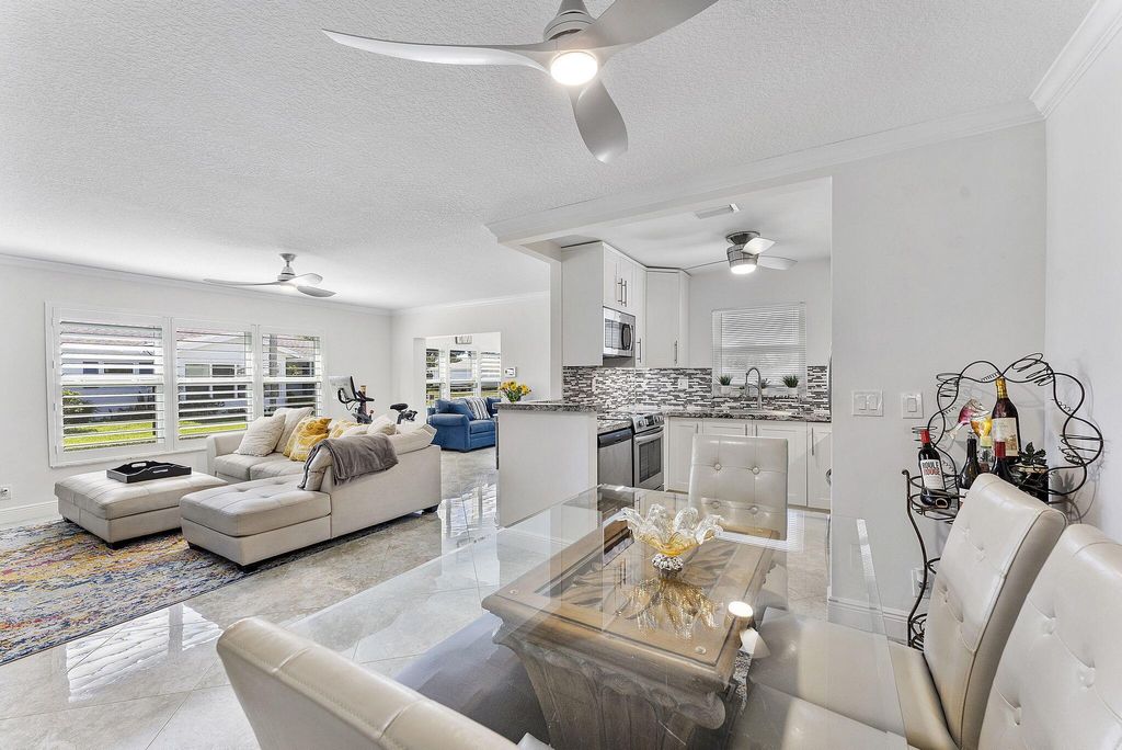 Photo of 5037 Lakefront Boulevard #D, Delray Beach, FL 33484 (MLS # R11137018)