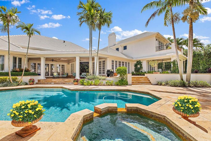 Stunning Estate home on 110 feet of Water Frontage. Situated on the desirable Commodore Island, close to the clubhouse and minutes to the Intracoastal waterways. This spacious single story main house features 4 bedrooms, an office, formal living and dining room, gourmet kitchen and a great room. The Guest apartment has 2 guest rooms with private baths as well as a full kitchen and family room. generator, impact windows, 4 car garage. This home is a welcoming retreat.