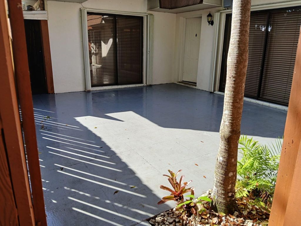 Photo of 9142 SW 23rd Street #D, Davie, FL 33324 (MLS # F10554768)