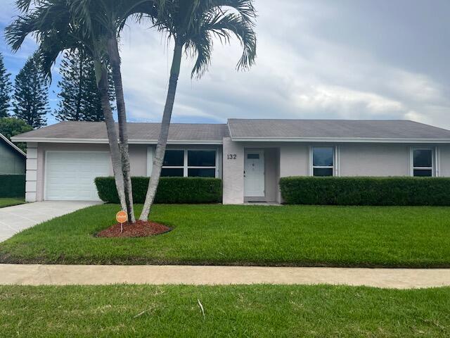 Photo of 132 Bobwhite Road, Royal Palm Beach, FL 33411 (MLS # B26075514)