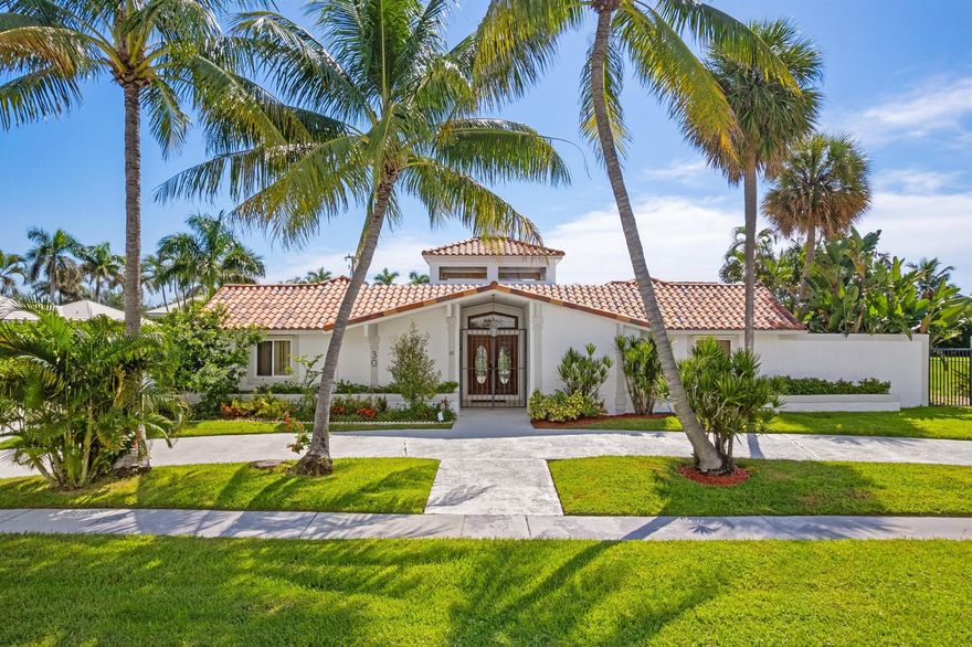 Located in the highly desirable Point Manalapan neighborhood, this prime property presents an exceptional opportunity to build your dream home on this expansive almost 1/4 acre lot or enjoy the current home hosting a five-bedroom, five-bathroom Spanish-style residence. Positioned on a quiet, low-traffic street, the property benefits from abundant natural light and privacy, with most rooms opening to a serene pool area. As a bonus, ownership includes complimentary membership at the La Coquille Club at the nearby oceanfront Eau Palm Beach Resort, providing access to top-tier amenities. Just minutes from beaches, fine dining, and shopping, this is the perfect canvas to create a custom home in one of South Florida's most sought-after locations.