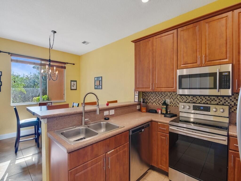 Photo of 2529 Stockbridge Square SW, Vero Beach, FL 32962 (MLS # R11145962)