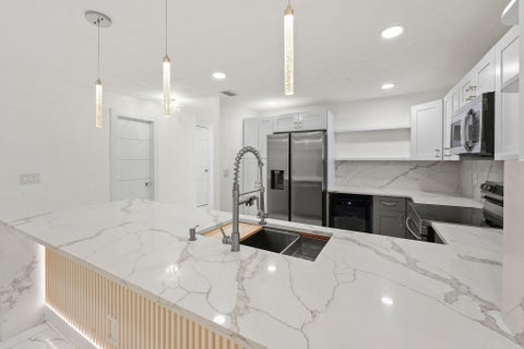Photo of 3844 ATLANTA Street, Hollywood, FL 33021 (MLS # B26087271)