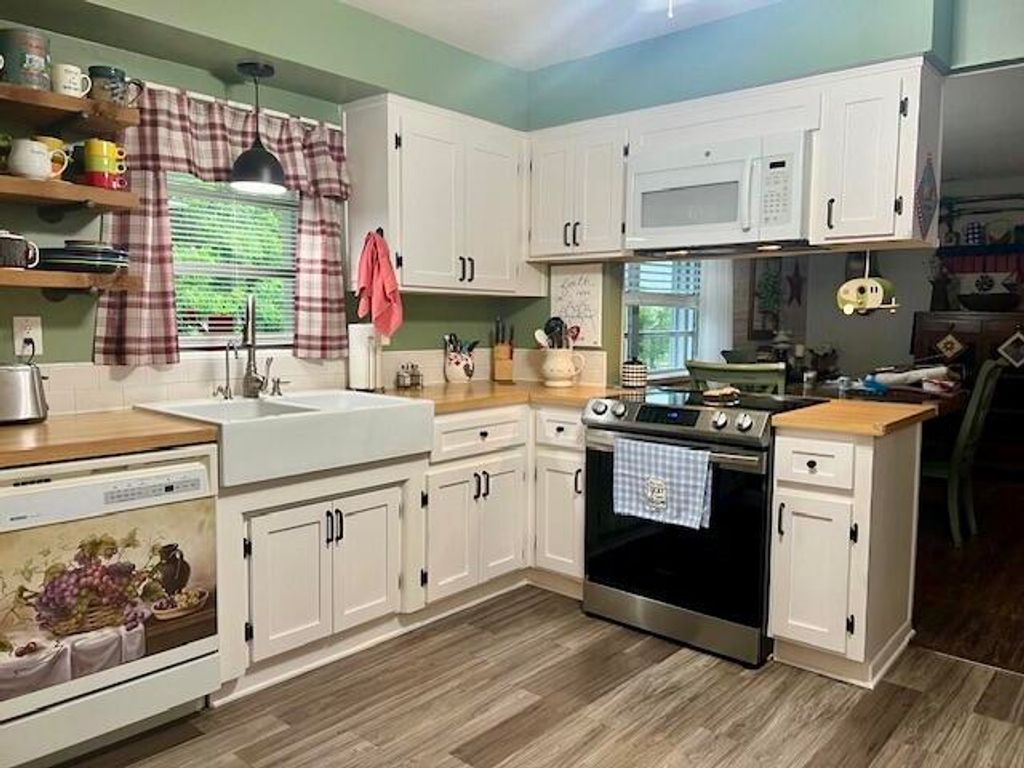 Photo of 609 SE 12th Street, Belle Glade, FL 33430 (MLS # R10996948)