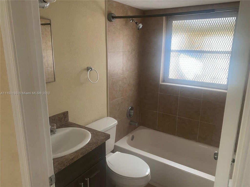 Photo of 1200 AC EVANS Street #1, Riviera Beach, FL 33404 (MLS # B26058083)