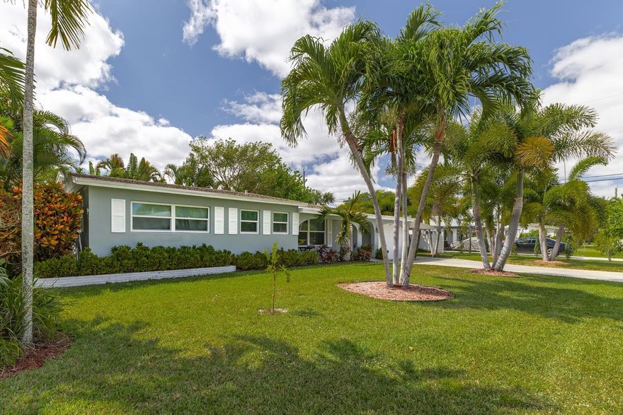 East Boca pool home situated on an oversized corner lot, conveniently located only one mile from the beach! This spacious property features 2 bedrooms, updated bathrooms, open living areas, large laundry room, tile flooring throughout and updated kitchen with stainless steel appliances. Have peace of mind with impact windows throughout and a fenced backyard. There's plenty of storage with built-in closets, storage room, and 1 car garage. Home is like new!