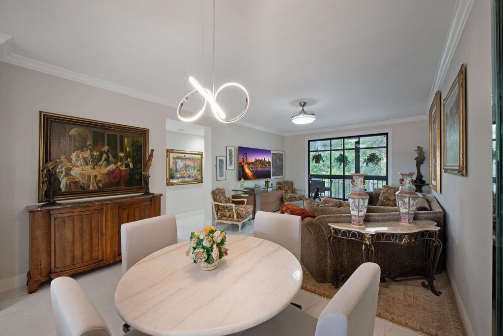 Photo of 6241 Pointe Regal Circle #403, Delray Beach, FL 33484 (MLS # R11127935)