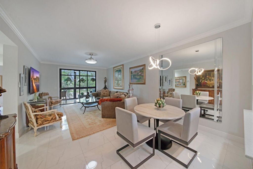 Photo of 6241 Pointe Regal Circle #403, Delray Beach, FL 33484 (MLS # R11127935)