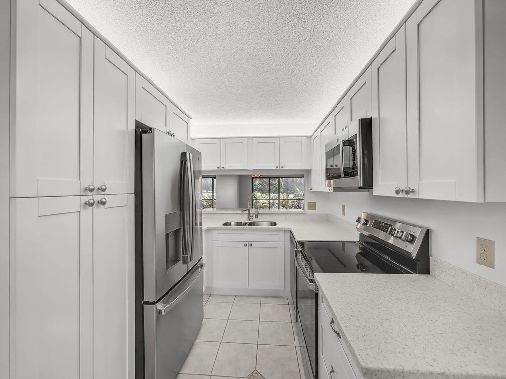 Photo of 1101 Keystone Drive N #F, Jupiter, FL 33458 (MLS # R11117327)