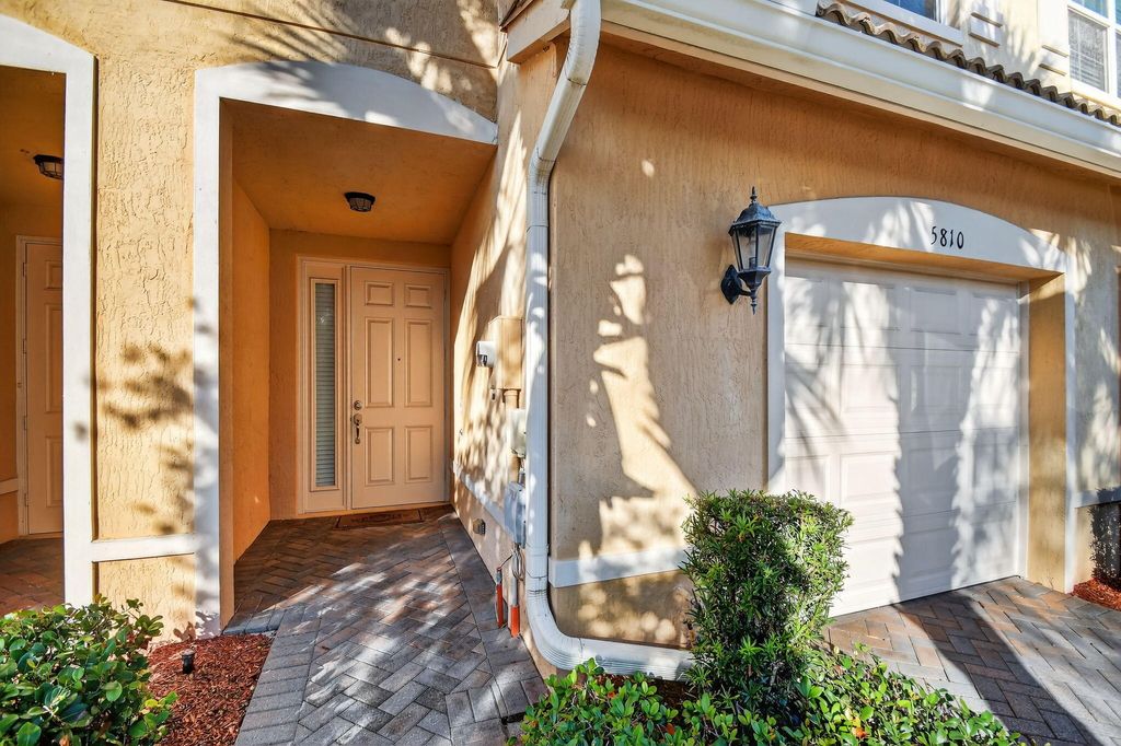 Photo of 5810 Monterra Club Drive, Lake Worth, FL 33463 (MLS # R11158308)