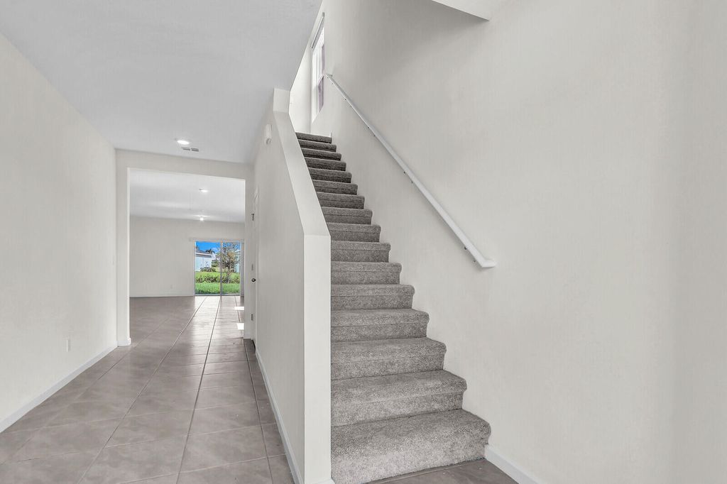 Photo of 12335 SW Nettuno Way, Port Saint Lucie, FL 34987 (MLS # R11111012)