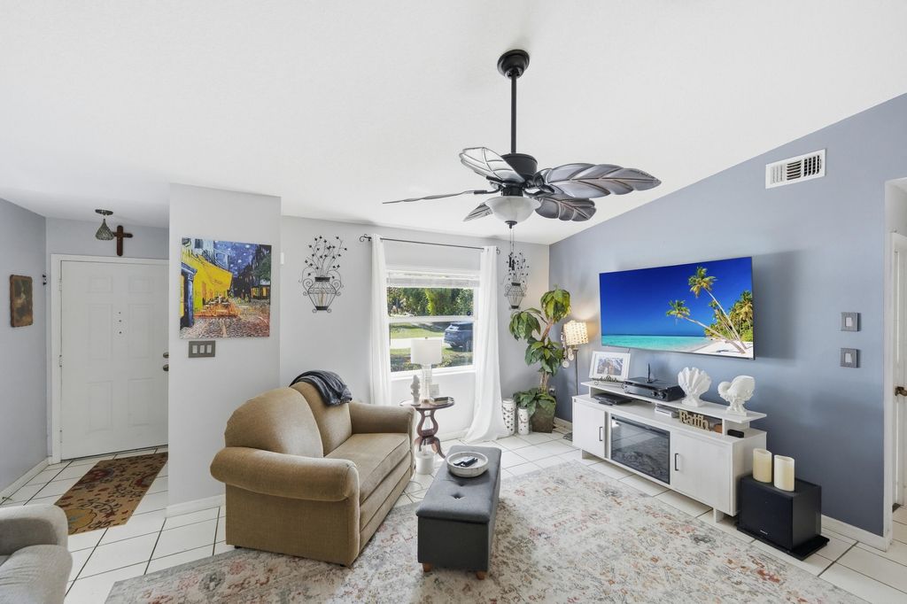 Photo of 225 SW Crescent Avenue, Port Saint Lucie, FL 34984 (MLS # B26005236)