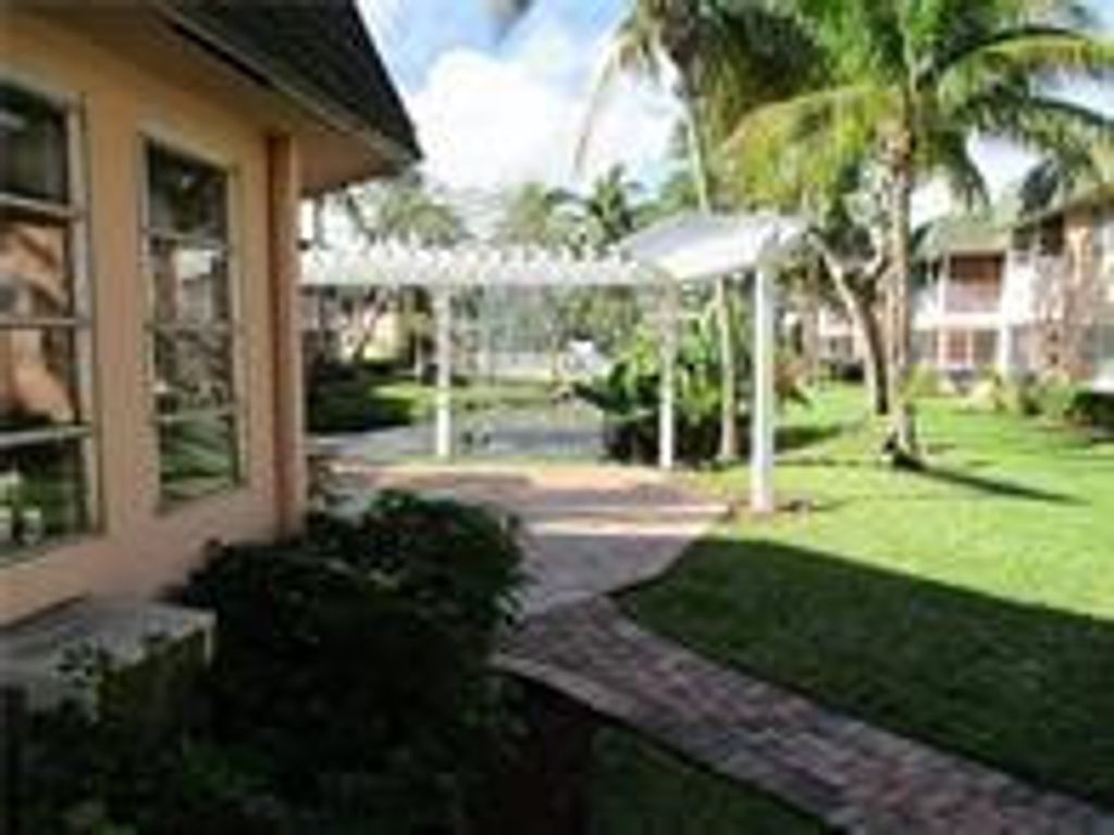 Photo of 770 SE 2nd Avenue #A104, Deerfield Beach, FL 33441 (MLS # B26013825)