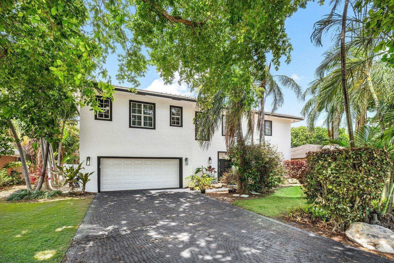 **Fully Furnished or Unfurnished Annual Lease Available for immediate move-in!** Welcome to paradise at this immaculate 5-bedroom, 4-bath home featuring an oversized media/bonus room. Spanning 3,948 square feet under air, this Boca dream home offers a resort-style backyard with a stunning pool and hot tub, complemented by a covered outdoor kitchen ideal for poolside entertaining amidst lush landscaping. Inside, discover a generously-sized living/dining area and a gourmet kitchen with granite countertops that inspire culinary creativity. Highlights include real wood floors, impact windows and doors, abundant natural light, an open floor plan, and options for formal dining or an additional den. The expansive master suite boasts a walk-in closet, ensuite bath with spa tub, and glass shower.