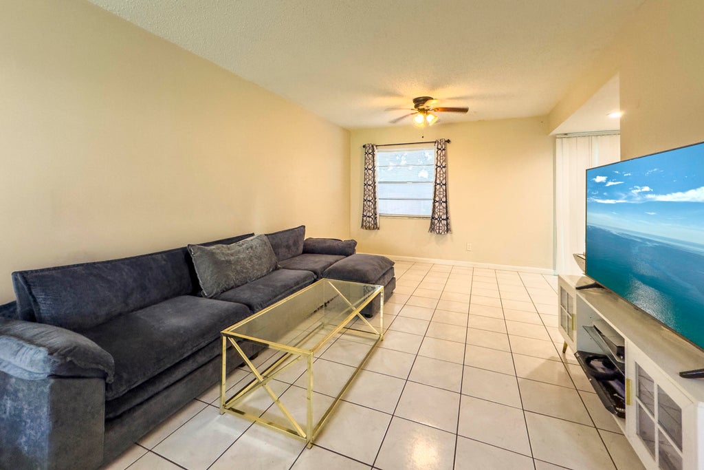 Photo of 4330 Lilac Street #K, Palm Beach Gardens, FL 33410 (MLS # B26076066)
