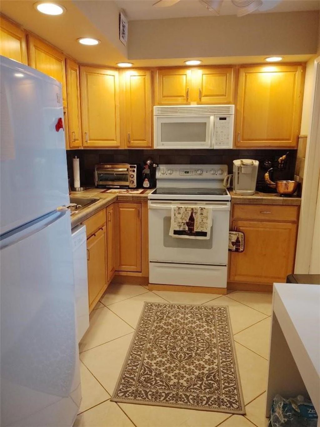Photo of 2691 S Course Drive #409, Pompano Beach, FL 33069 (MLS # B26017346)