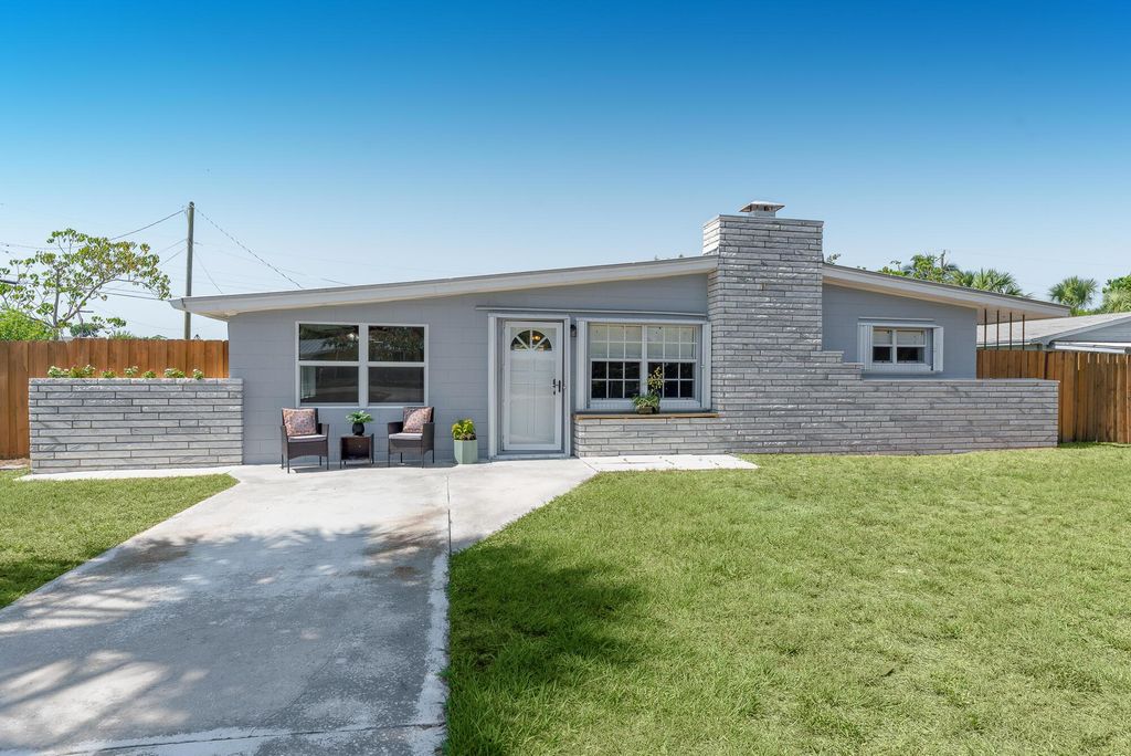 Photo of 1036 NE Terrace Way, Jensen Beach, FL 34957 (MLS # R10995213)