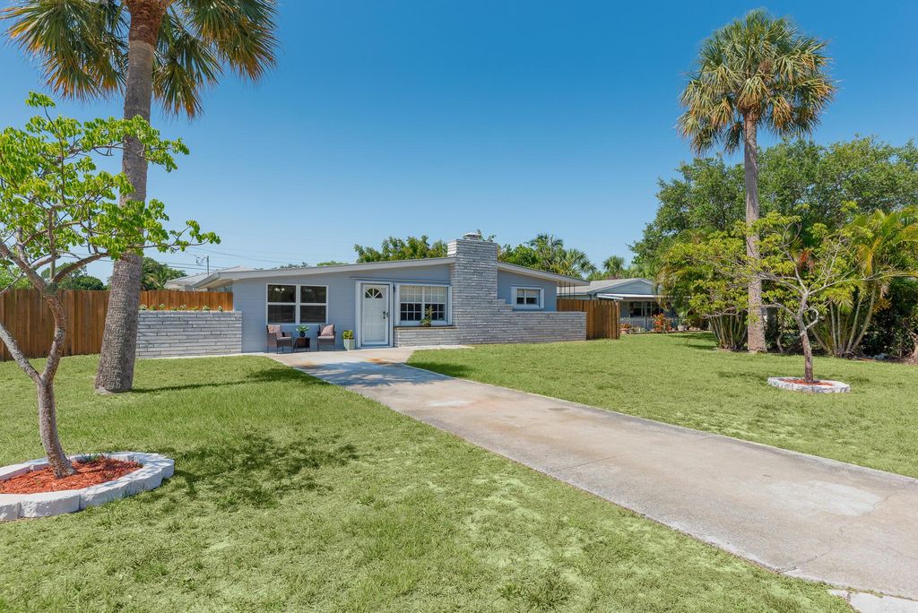 Photo of 1036 NE Terrace Way, Jensen Beach, FL 34957 (MLS # R10995213)