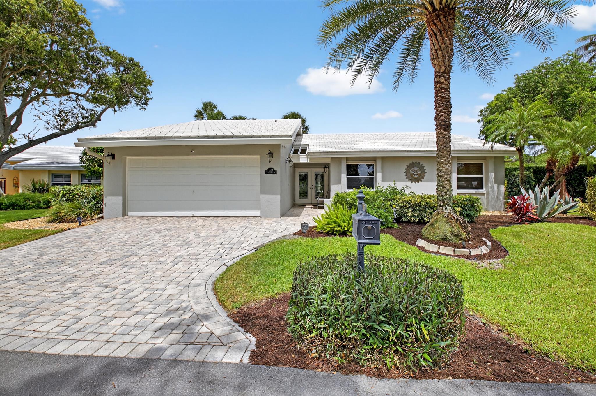 ALL AGE - PET FRIENDLY COMMUITY Rare opportunity, this caliber home doesn't come available often in CAMEO WOODS. One of the best locations in the community. This jewel of a home was renovated top to bottom. The rectified ceramic tile was laid throughout the home. Then the solid maple cabinetry was installed in the kitchen, dry bar and bathrooms. Granite counter tops and crown molding complete the look. The home boasts a private paver driveway and patio with surrounding garden. Must see to appreciate. A+ Schools ,close to shopping, I-95 and beaches.Additional features include: Updated Panel Box, Electric Shutters, Broten Garage DoorCommunity maintenance includes: lawn care, annual roof cleaning, community tree trimming, House Painting every 5-7 years and more.