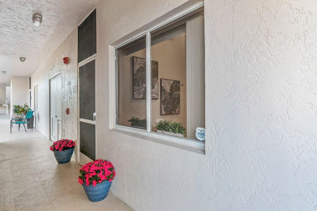 Photo of 5032 Rosehill Drive #103, Boynton Beach, FL 33437 (MLS # R10947142)