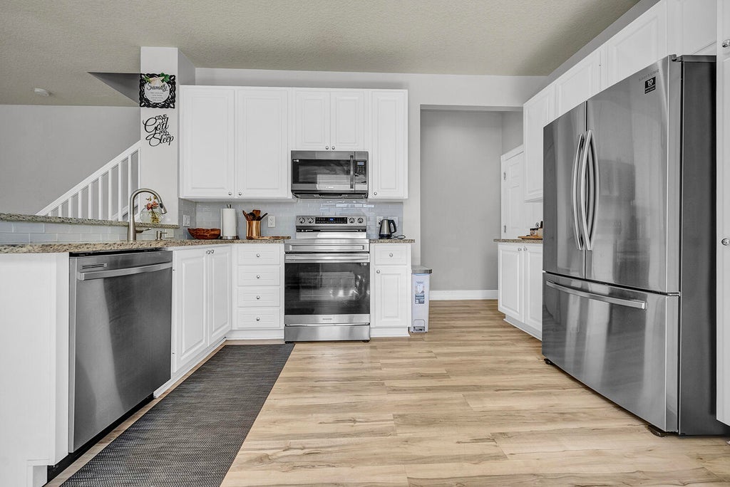 Photo of 1106 Pinewood Lake Court, Greenacres, FL 33415 (MLS # B26073994)