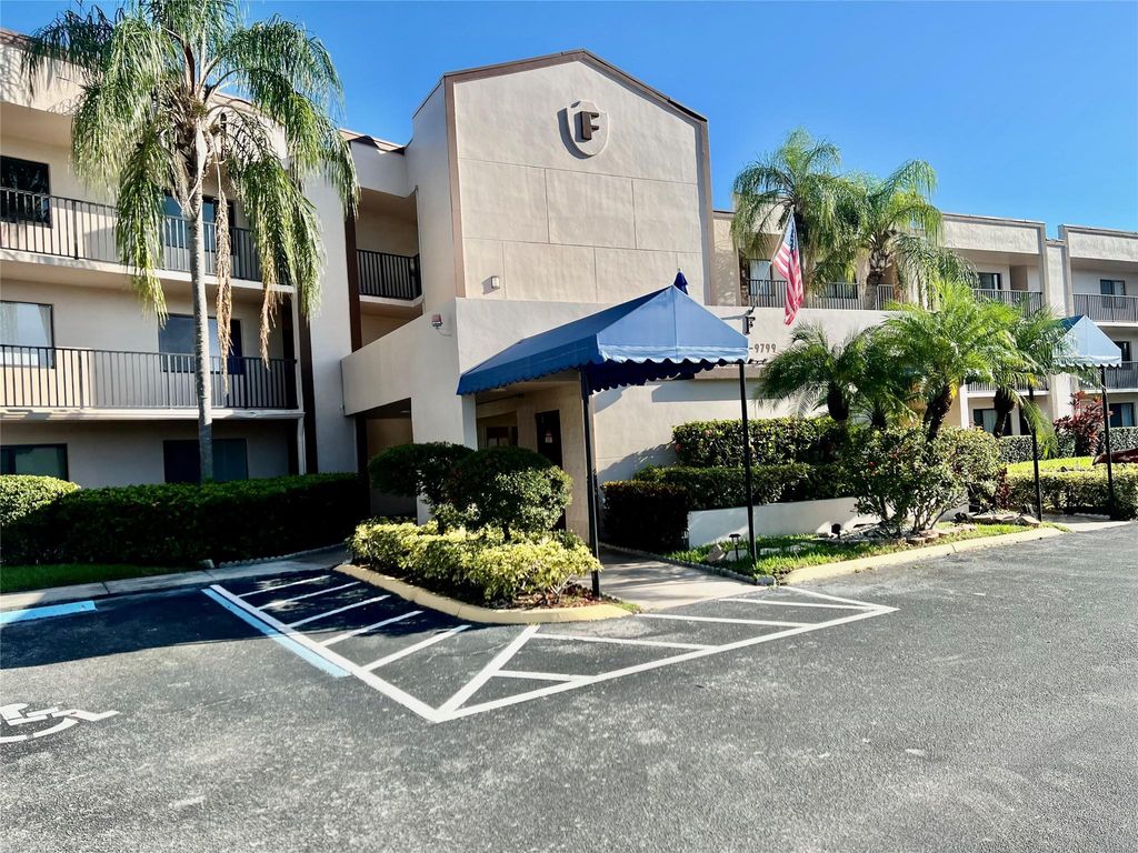 Photo of 9767 N Belfort Cir #205, Tamarac, FL 33321 (MLS # F10530720)