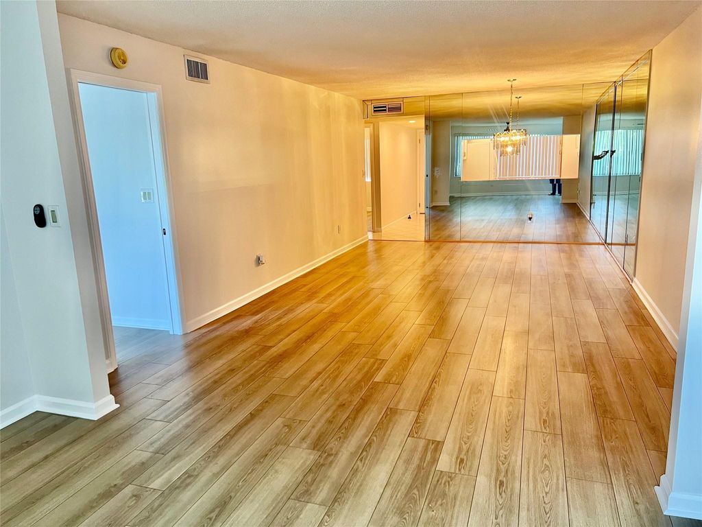 Photo of 9767 N Belfort Cir #205, Tamarac, FL 33321 (MLS # F10530720)