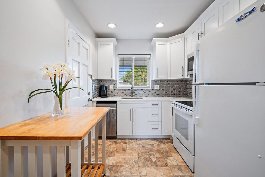 Adorable FULLY FURNISHED and newly RENOVATED rental! 6 Garden Street #205P in Tequesta Gardens is a SPACIOUS 2 bedroom 2 bathroom condo with over 900 square feet of living space and is located on the 2nd floor and the PERFECT place to live the south Florida lifestyle. It is located in a 55+ community in the quaint little village of Tequesta. Step inside your BRIGHT home and you will notice an AMPLE amount of natural light as well as the wood-like floors flowing effortlessly through your main living spaces. As you walk in, to your left you have your dining area and ahead of you, you will see your SIZABLE living space.