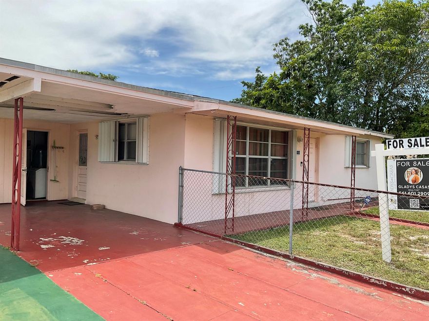 FANTASTIC OPPORTUNITY TO OWN IN A PRIME LOCATION! This 2 Bedrooms 1 Bath home is Located in walking distance from City Palace, Kravis Center, The PBC Convention Center, Atlantic University, Flagler. Less than 10 Minutes from Flagler, Palm Beach, and International Airport. It is located on the heart of West Palm Beach.The home has a very large yard, with car port and plenty of parking, new AC Unit 2019, New Water Heater 2024 Termite Tent done May 2025  Guaranty Transferable to new owner.Great for investor, (Airbnb). Don't let this great opportunity Go-By.SOLD AS IS!