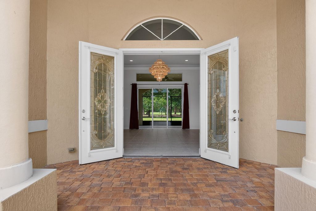 Photo of 9523 Shadow Lane, Fort Pierce, FL 34951 (MLS # B26030963)