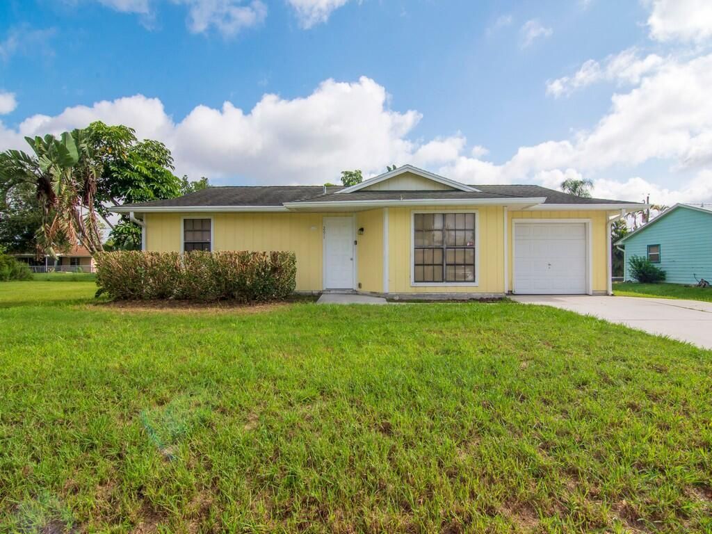 Photo of 291 SW Langfield Avenue, Port St Lucie, FL 34984 (MLS # R10896807)