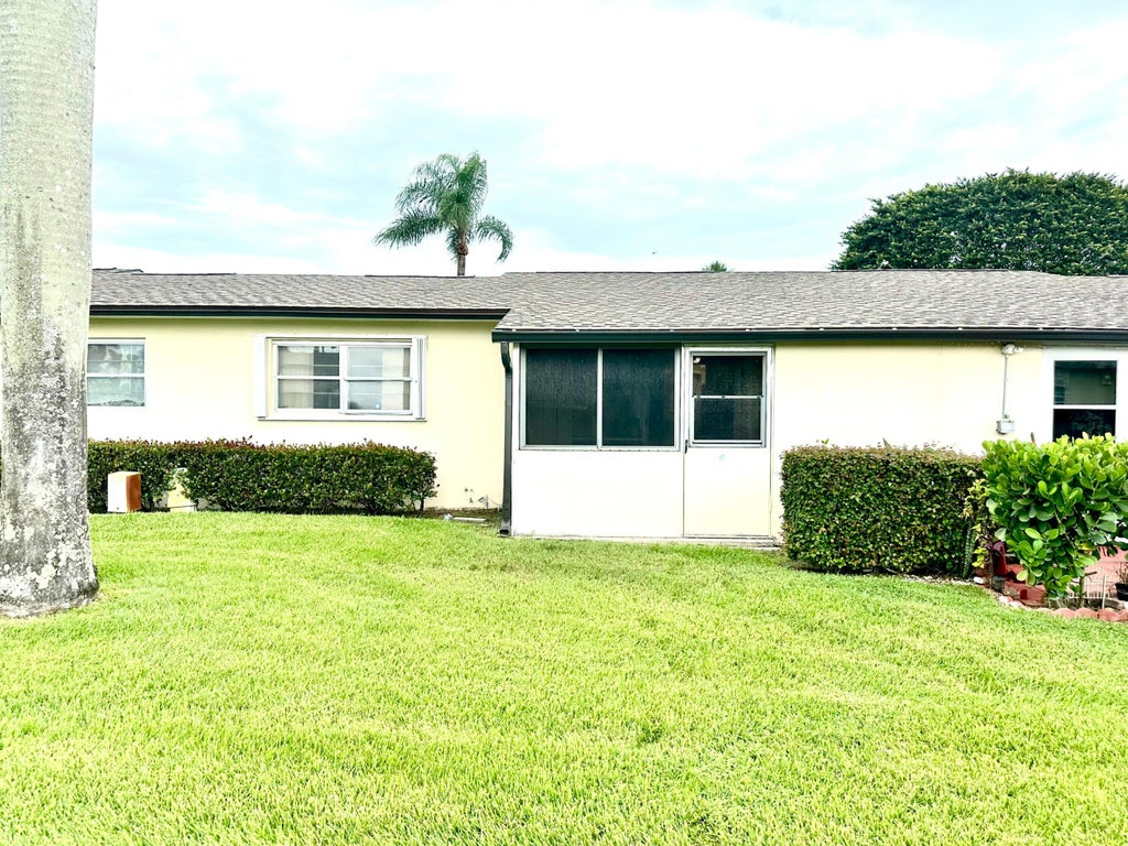 Photo of 2751 Ashley Drive E #D, West Palm Beach, FL 33415 (MLS # B26082321)