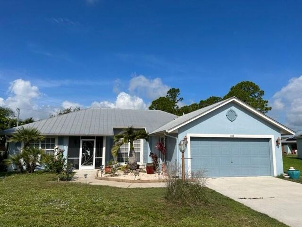 Photo of 504 SW Pea Court, Port St Lucie, FL 34953 (MLS # R10897309)